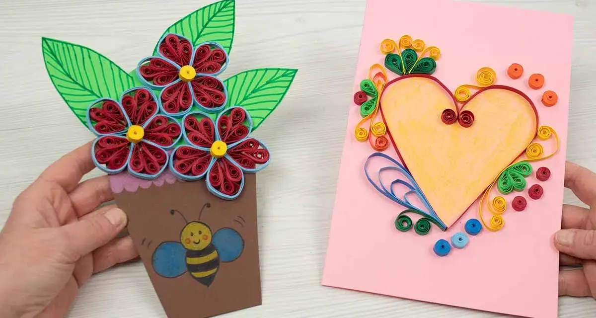 Manualidades Día de la Madre: un ramo de flores de papel quilling en una maceta con una abeja y una tarjeta rosa con un corazón.
